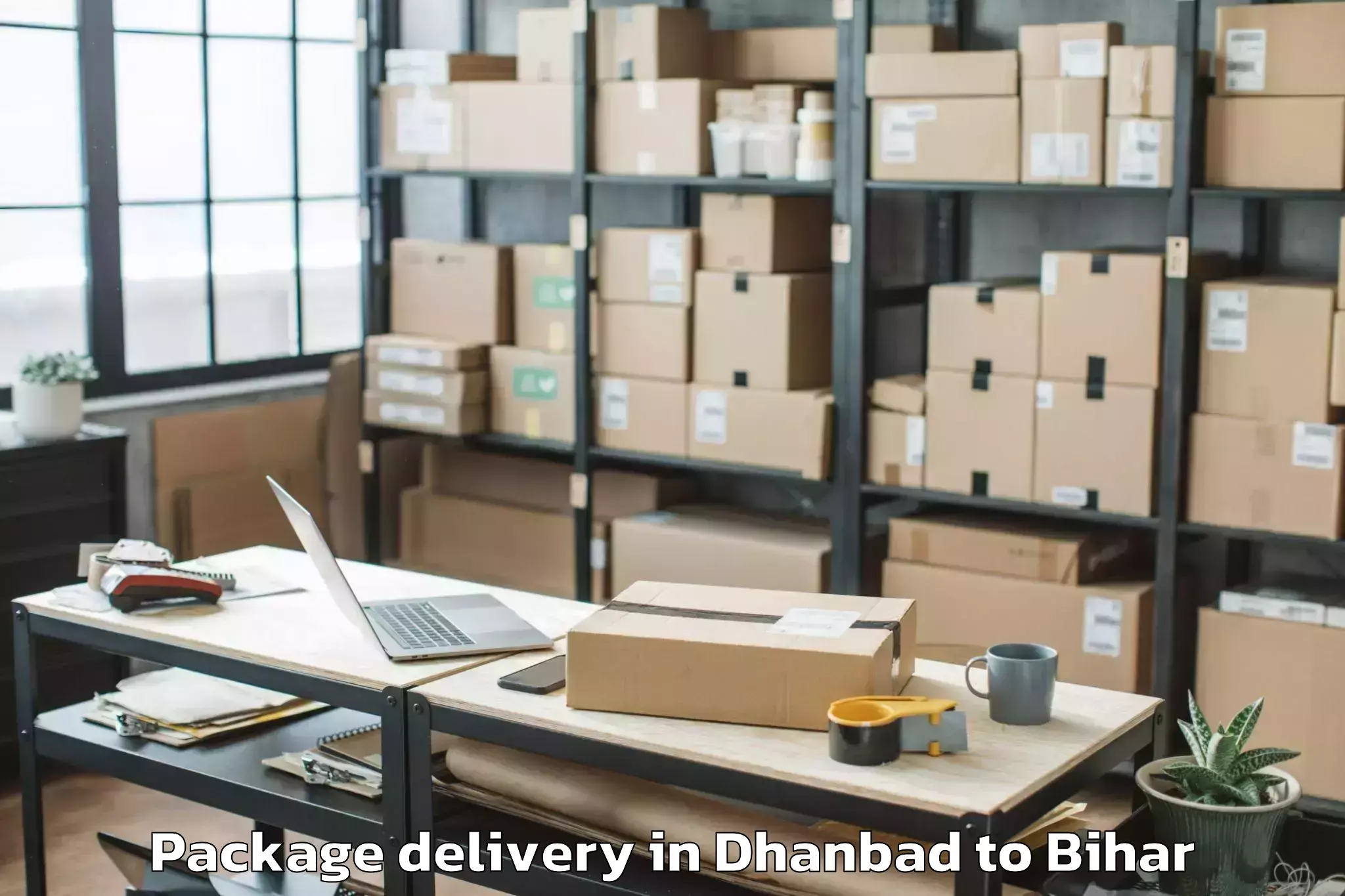 Trusted Dhanbad to Triveniganj Package Delivery